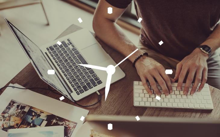 Clock overlay on image of a man typing